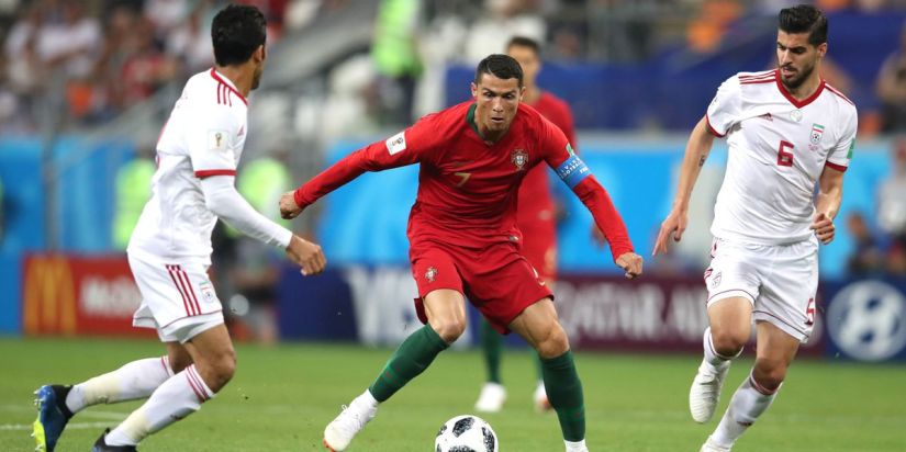 cristiano-ronaldo-of-portugal-challenge-for-the-ball-with-saeid-and-picture-id983727870-hero-large-7824205d-1f06-4578-add7-841cffdfcf47